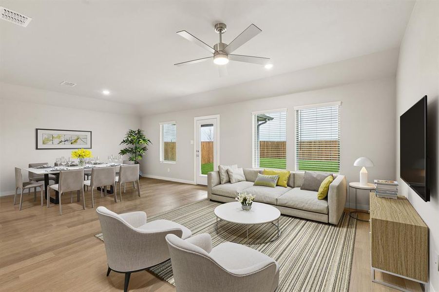 Living Room in the Emmy II home plan by Trophy Signature Homes - REPRESENTATIVE PHOTO