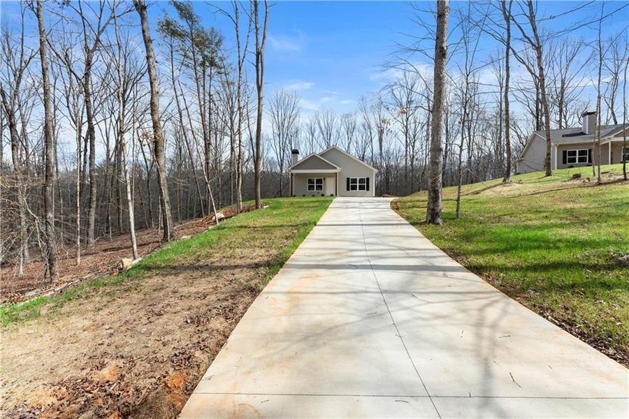 Front exterior of a new home in , Cleveland, GA, highlighting curb appeal (Image 18). Front exterior of a new home in , Cleveland, GA, highlighting curb appeal (Image 18).