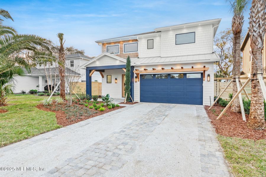 Front exterior of a new home in , Jacksonville Beach, FL, highlighting curb appeal (Image 22).