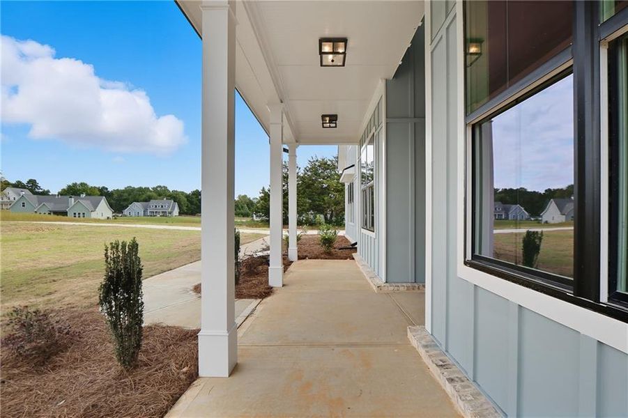 Exterior details and patio area of a home in Old Town Estates, Dacula (Image 32).