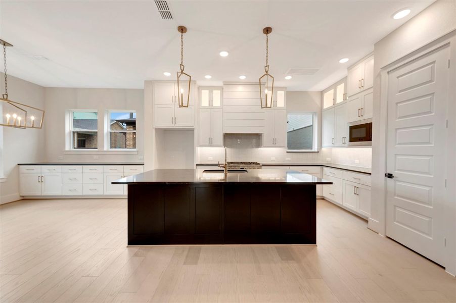 Furnished interior view inside a new home in Easthaven at Bridgeland Central - Vision Collection, Cypress (Image 3).