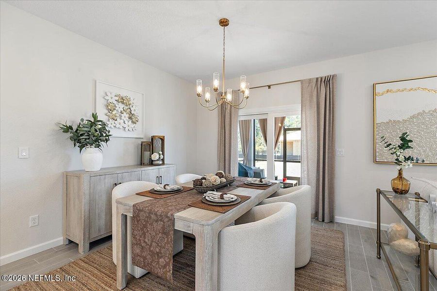 Furnished interior view inside a new home in Edenbrooke at Hyland Trail | 55+, Green Cove Springs (Image 13).