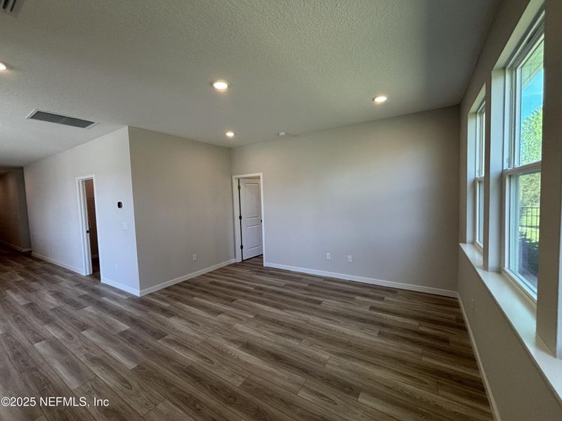 Spacious, unfurnished interior of a new home in The Magnolia Series at Reserve East, Flagler Beach (Image 14).
