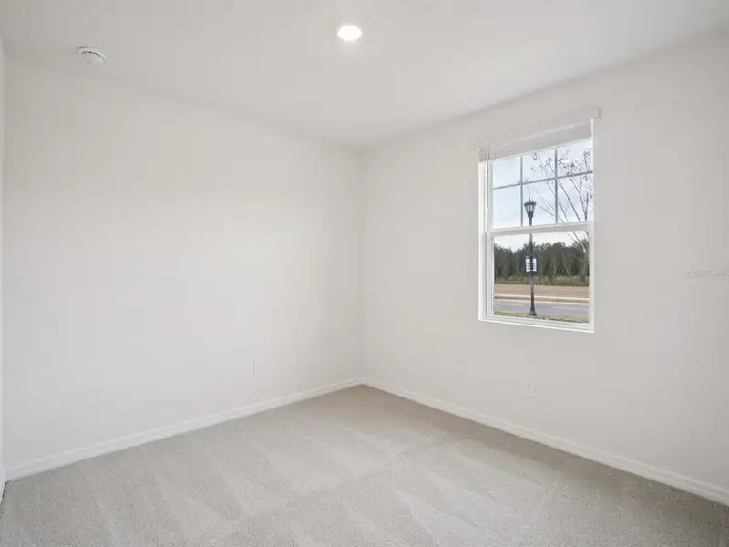 Spacious, unfurnished interior of a new home in The Grove at Stuart Crossing - Classic Series, Bartow (Image 11). Spacious, unfurnished interior of a new home in The Grove at Stuart Crossing - Classic Series, Bartow (Image 11).