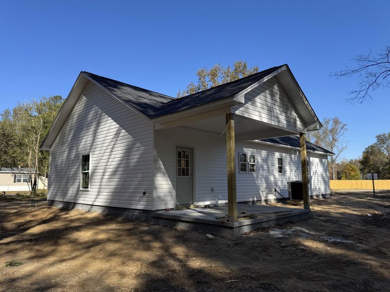 Exterior details and patio area of a home in , Cottageville (Image 1).