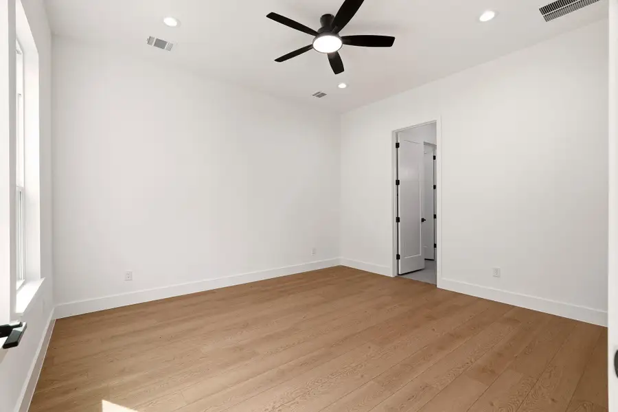 Master Bedroom micro beveled lvp  floors and ceiling fan