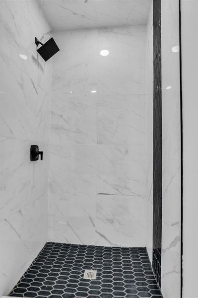 Bathroom featuring a shower Bathroom featuring a shower