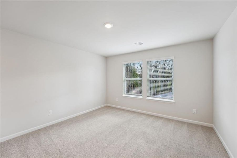 Spacious, unfurnished interior of a new home in Westmont Preserve, Powder Springs (Image 28).