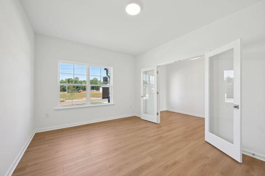 Representative unfurnished interior of a home built from the Jordan by Ashton Woods in Rowland's Grant, Fuquay Varina (Image 32).