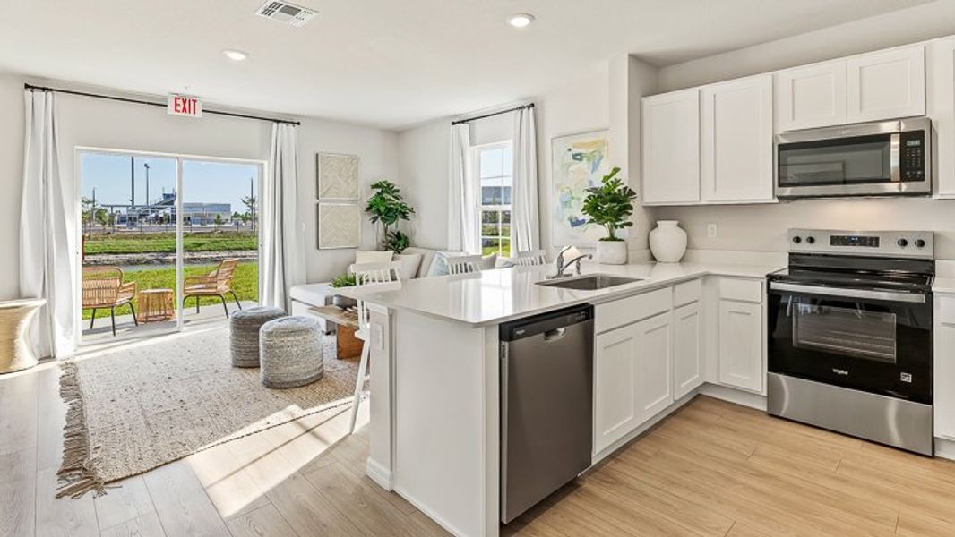 Representative furnished interior of a home built from the Pearson B by D.R. Horton in Townes at Island Lake, Pinellas Park (Image 9).