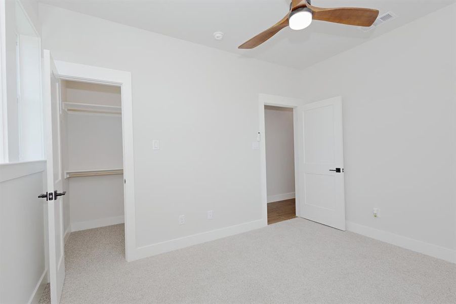 Guest Bedroom is designed for comfort with a walk-in closet. Guest Bedroom is designed for comfort with a walk-in closet.