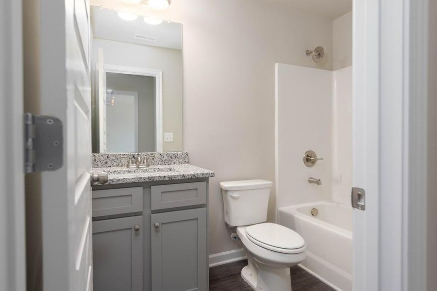 Furnished interior view inside a new home in Sutton's Landing, Statham (Image 7).