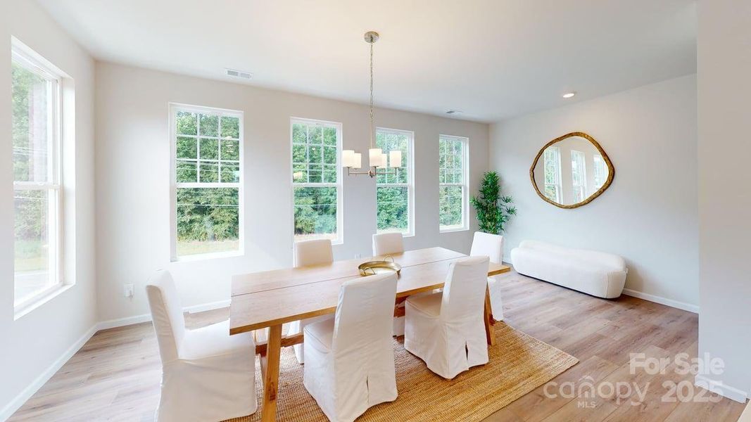 Furnished interior in a model home at Vanguard at Vermillion in Huntersville (Image 4).