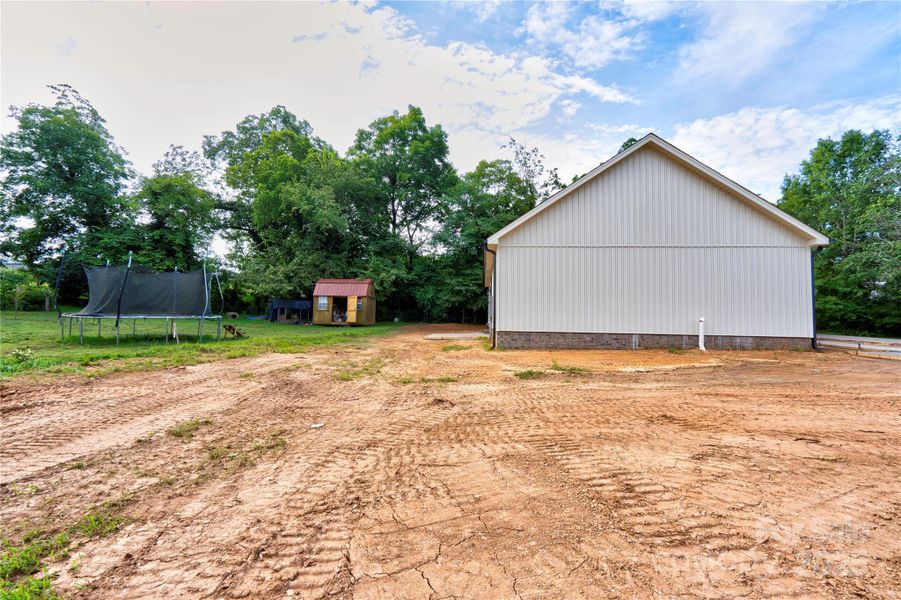 Front exterior of a new home in , Kings Mountain, NC, highlighting curb appeal (Image 18).