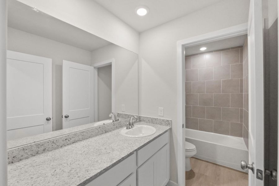 Furnished interior view inside a new home in Lakes at Crockett Martin, Conroe (Image 4). Furnished interior view inside a new home in Lakes at Crockett Martin, Conroe (Image 4).