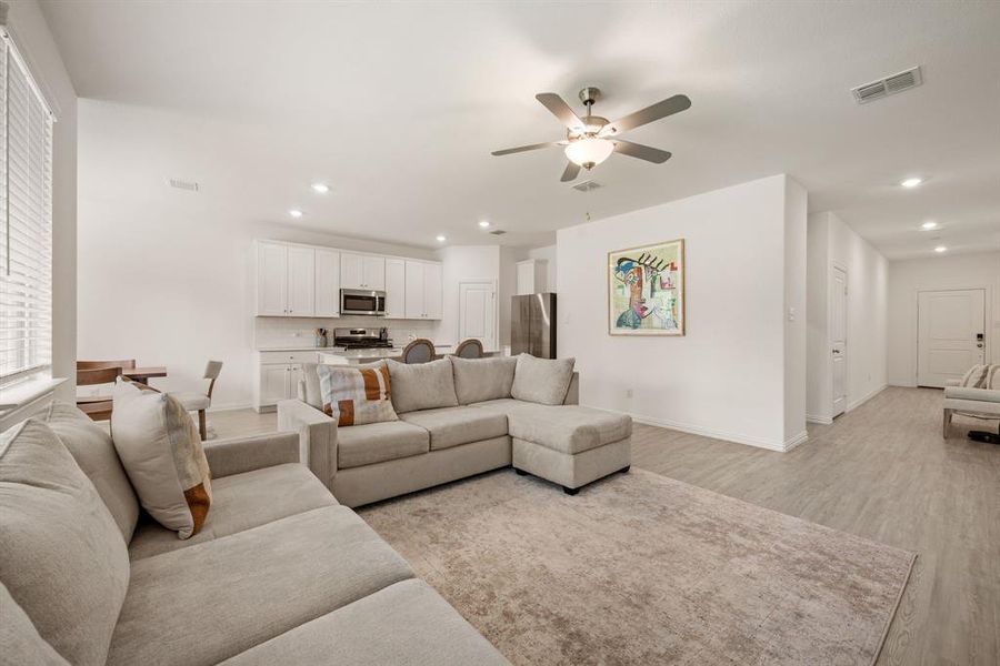 Furnished interior view inside a new home in Hurricane Creek: Classic 60s, Anna (Image 9). Furnished interior view inside a new home in Hurricane Creek: Classic 60s, Anna (Image 9).