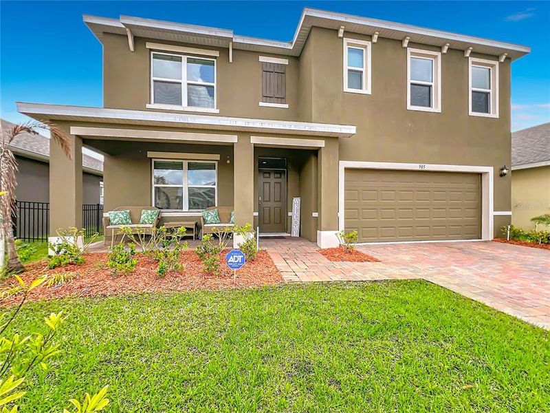 Exterior details and patio area of a home in Cypress Bay West, Palm Bay (Image 4).