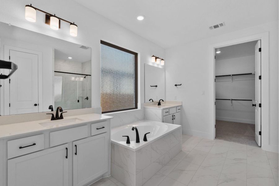 Primary Bath retreat with dual vanities & garden tub