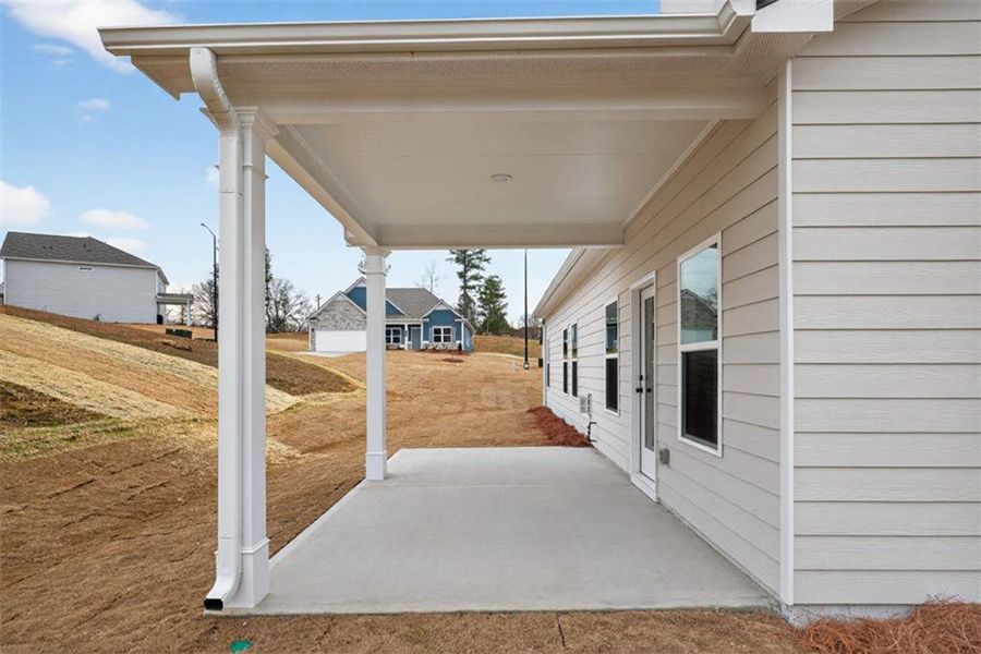Exterior details and patio area of a home in Jones Ridge, Dallas (Image 27).