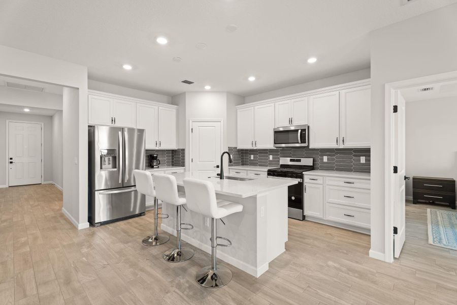 Furnished interior view inside a new home in Veranda Gardens, Port St. Lucie (Image 10).