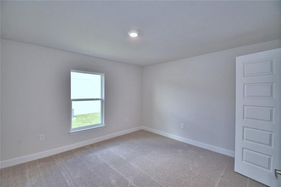 Spacious, unfurnished interior of a new home in Lake Juliana Estates, Auburndale (Image 55).