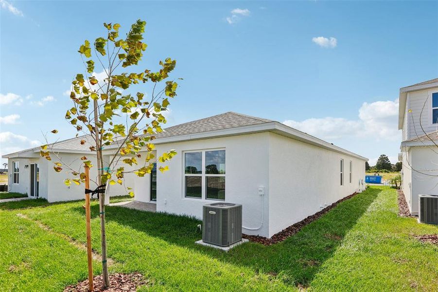 Exterior details and patio area of a home in Willowbrook North, Winter Haven (Image 22).