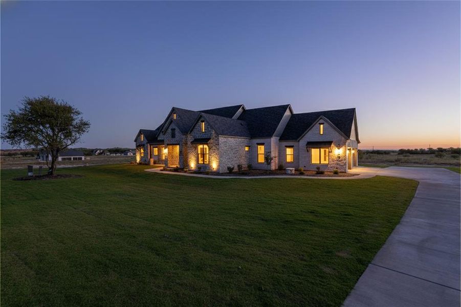 This home features sod to street with sprinkler system for easy maintenance. This home features sod to street with sprinkler system for easy maintenance.