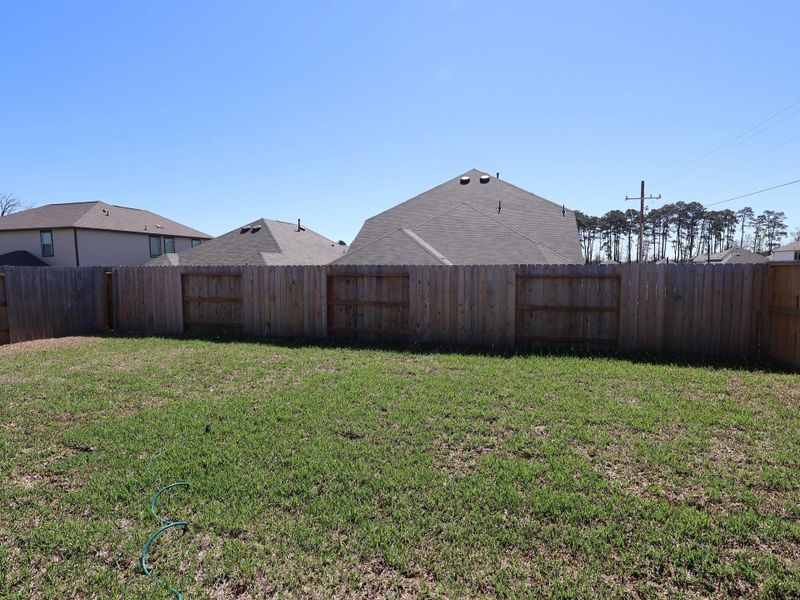 Exterior details and patio area of a home in Moran Ranch, Willis (Image 18).
