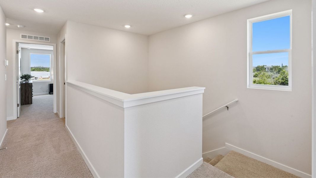 Representative unfurnished interior of a home built from the Sterling by D.R. Horton in Fish Lake Cove, Kissimmee (Image 14). Representative unfurnished interior of a home built from the Sterling by D.R. Horton in Fish Lake Cove, Kissimmee (Image 14).