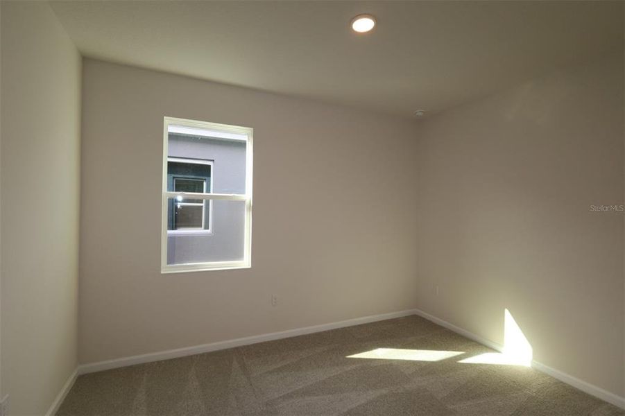 Spacious, unfurnished interior of a new home in Estates at Rivercrest, Sanford (Image 15).