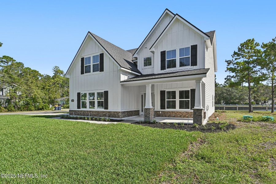 Front exterior of a new home in , Fernandina Beach, FL, highlighting curb appeal (Image 28).
