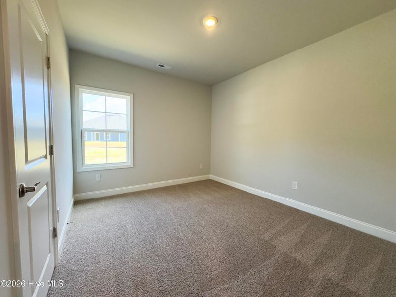 Spacious, unfurnished interior of a new home in East Lake, Leland (Image 21).