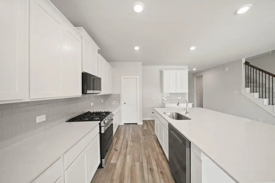 Furnished interior view inside a new home in Country Creek, Mont Belvieu (Image 6).