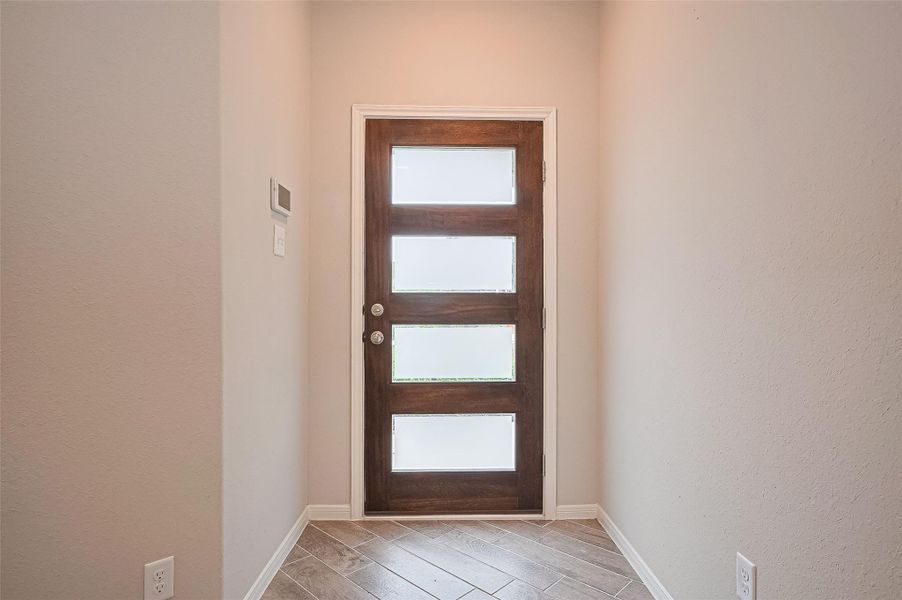 Spacious, unfurnished interior of a new home in Sunterra, Katy (Image 25).