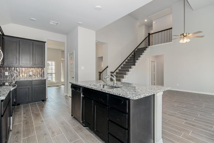 Furnished interior view inside a new home in Mustang Place II, Heartland (Image 7).