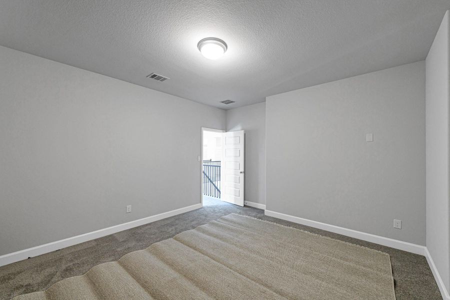 Spacious, unfurnished interior of a new home in Cross Creek West 55', Fulshear (Image 24). Spacious, unfurnished interior of a new home in Cross Creek West 55', Fulshear (Image 24).