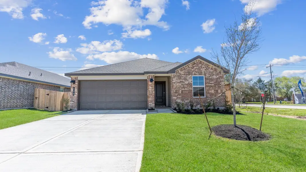 Front exterior of a new home in Caldwell Crossing, Iowa Colony, TX, highlighting curb appeal (Image 1). Front exterior of a new home in Caldwell Crossing, Iowa Colony, TX, highlighting curb appeal (Image 1).