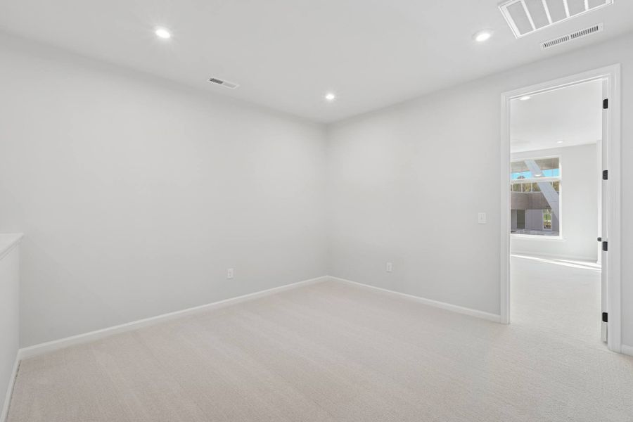 Representative unfurnished interior of a home built from the Wilson by Tri Pointe Homes in The Townes at NoVi, Pittsboro (Image 21).