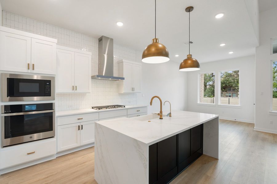 Furnished interior view inside a new home in Wolf Ranch, Georgetown (Image 10).