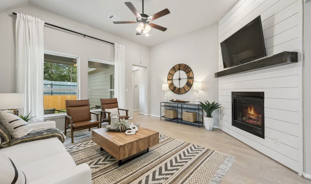 Great room with ceiling fan