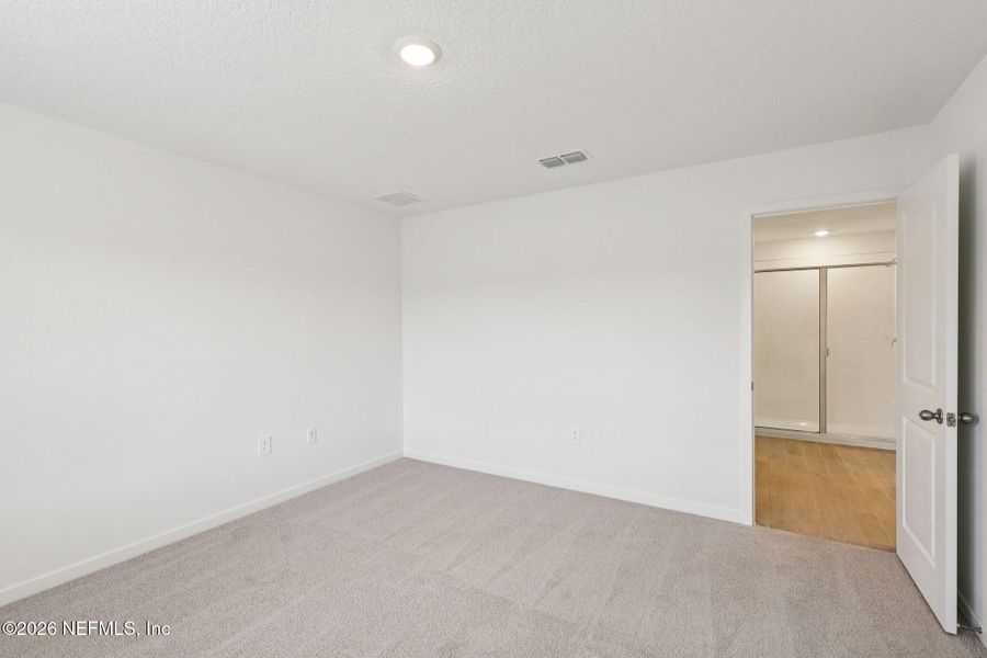 Spacious, unfurnished interior of a new home in Cypress Meadows - Signature Series, Jacksonville (Image 30).