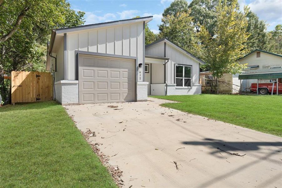 Front exterior of a new home in , Sulphur Springs, TX, highlighting curb appeal (Image 2). Front exterior of a new home in , Sulphur Springs, TX, highlighting curb appeal (Image 2).