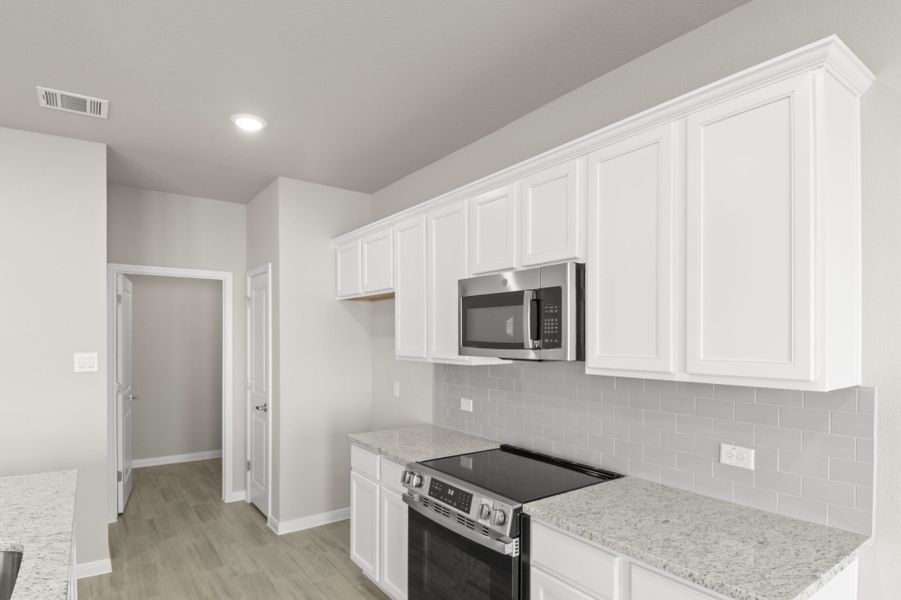 Furnished interior view inside a new home in Sonterra, Jarrell (Image 7).