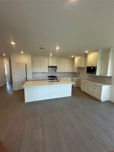Open kitchen, tons of storage and set up for entertaining!