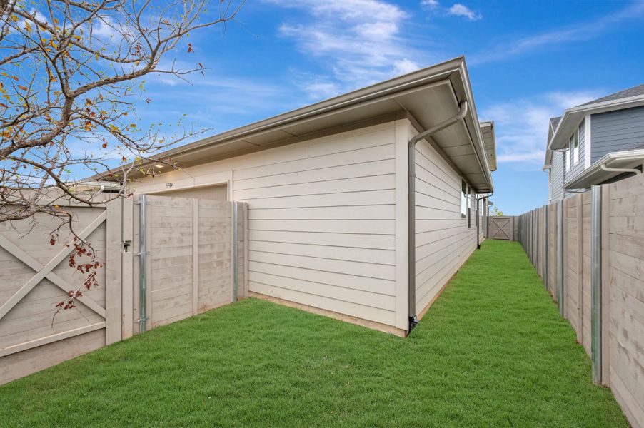 Exterior details and patio area of a home in Painted Tree, McKinney (Image 3).