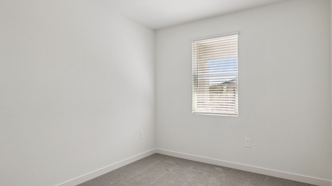 Representative unfurnished interior of a home built from the Hayden by D.R. Horton in The Ridge at Stone Butte, Phoenix (Image 17).