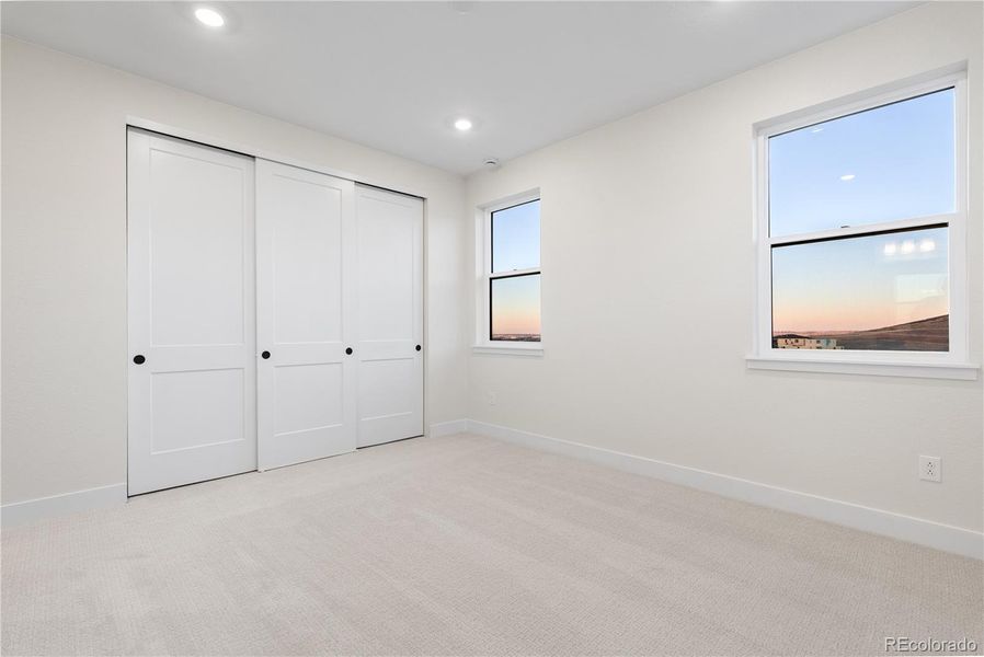 Spacious, unfurnished interior of a new home in Autograph at Lyric, Lone Tree (Image 39).