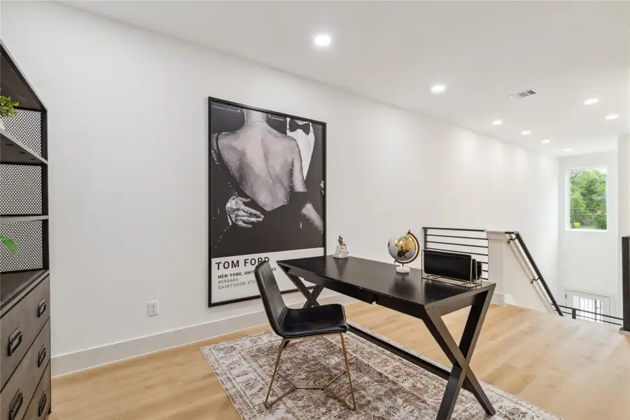 Overlooking the grand entry, this upstairs flex space is bathed in natural light from high windows—creating a bold and bright area to work, unwind, or showcase your style. Overlooking the grand entry, this upstairs flex space is bathed in natural light from high windows—creating a bold and bright area to work, unwind, or showcase your style.