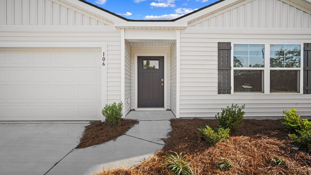 Exterior details and patio area of a home in Longleaf Village, Rincon (Image 2). Exterior details and patio area of a home in Longleaf Village, Rincon (Image 2).