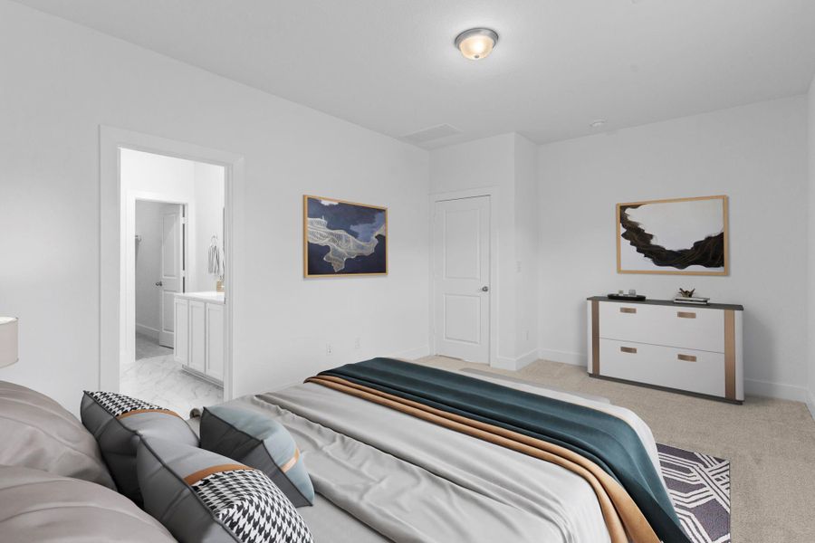 The primary suite is tucked away from all other guest bedrooms for privacy!  *Virtually Stage Photo*